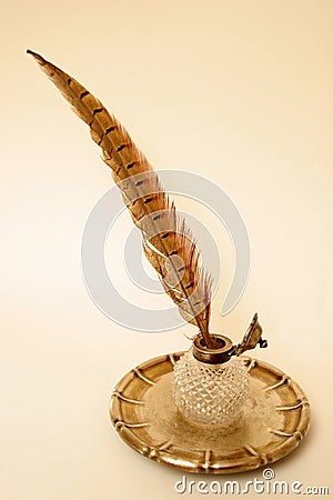 Feather and inkwell Stock Photo