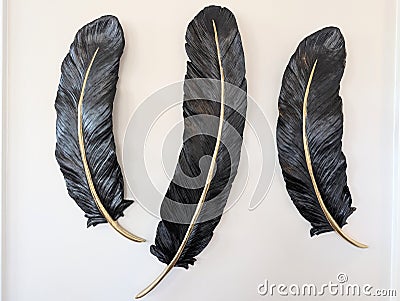 Feather wall decor hangings in a modern home Stock Photo