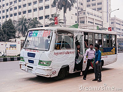 Bangladesh people on public bus in Dhaka city busy street Editorial Stock Photo
