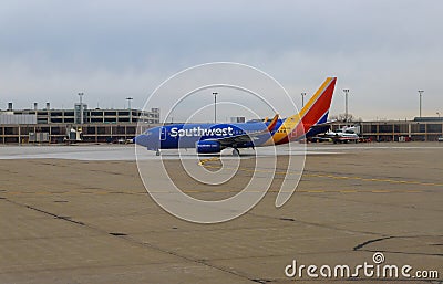 Southwest colorful jet inches from landing at Cleveland Hopkins Editorial Stock Photo