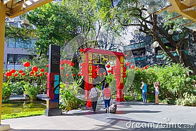 Feb 24, 2018 People waling greentbel park in Makati City Editorial Stock Photo