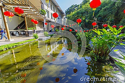 Feb 24, 2018 People waling greentbel park in Makati City Editorial Stock Photo