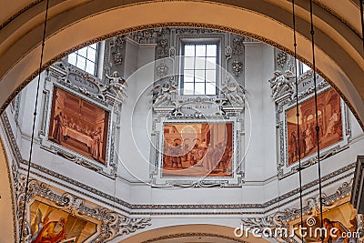 Feb 4, 2020 - Salzburg, Austria: Paintings with murals under window of the dome inside Salzburg Cathedral Editorial Stock Photo