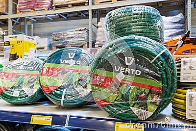 February 24, 2021 Beltsy Moldova. Huge supermarket, garden department. Showcase with watering and irrigation systems Editorial Stock Photo