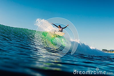 February 15, 2022. Brazil, Florianopolis. Woman during surfing with morning light Editorial Stock Photo