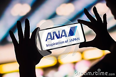 February 4, 2023, Brazil. The All Nippon Airways (ANA) logo is displayed on a smartphone screen Cartoon Illustration