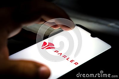 February 26, 2021, Brazil. In this photo illustration the Parler logo seen displayed on a smartphone screen Cartoon Illustration