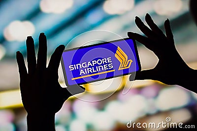 February 6, 2023, Brazil. In this photo illustration, the Singapore Airlines logo is displayed on a smartphone screen Cartoon Illustration