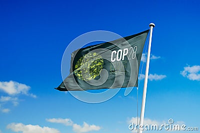 February 1, 2023, Brazil. The 2023 United Nations Climate Change Conference COP28 UAE soon appears on a flag. Event will be on 6- Editorial Stock Photo