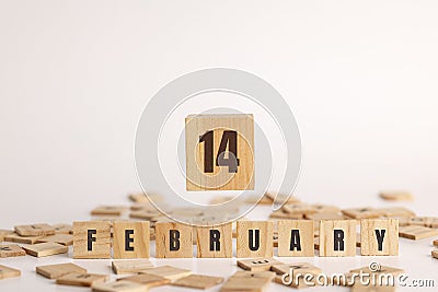 February 14 displayed wooden letter blocks on white background Stock Photo