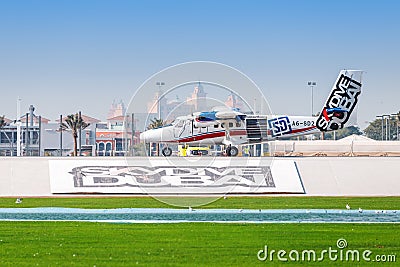 Skydive light propeller plane takes off from the sea air strip to gain altitude and drop Editorial Stock Photo
