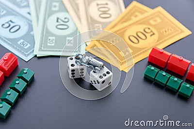 February 8, 2015: Houston, TX, USA. Monopoly car, dice, money, Editorial Stock Photo