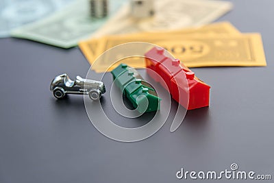 February 8, 2015: Houston, TX, USA. Monopoly car, dice, money, Editorial Stock Photo