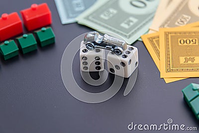 February 8, 2015: Houston, TX, USA. Monopoly car, dice, money, Editorial Stock Photo
