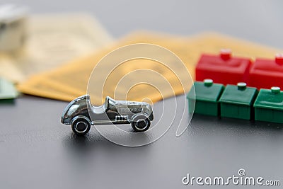 February 8, 2015: Houston, TX, USA. Monopoly car, dice, money, Editorial Stock Photo