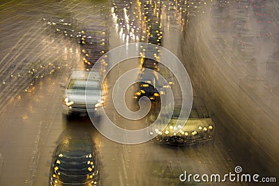 FEBRUARY 2, 2019 - LOS ANGELES, CA, USA - Abstract and impressionistic Traffic Congestion in a rain storm on the 110 CA Freeway, t Editorial Stock Photo