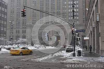 9 February 2017 - New York City, NY: Winter storm Niko hits New York City. Park Avenue covered with snow, in front of the Helmsley Editorial Stock Photo