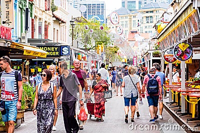 2019 February 28, Singapore - People walking and shopping in downtown Editorial Stock Photo