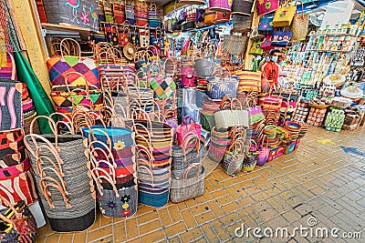 large pile of various wicker hand made baskets for sale on the African market in Global Village. Editorial Stock Photo