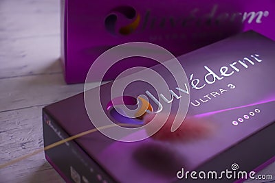 February 25, 2022, Ukraine, skin beautiful needle city,illustrative box of Juvederm filler, Allergan company, , flower Editorial Stock Photo