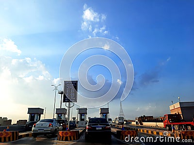 The fee station gates of Rod El Farag axis bridge which is a cable-stayed bridge over the Nile river crossing Cairo Editorial Stock Photo