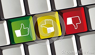 Feedback satisfaction thumb up down buttons on Laptop Keyboard - Concept Review Stock Photo