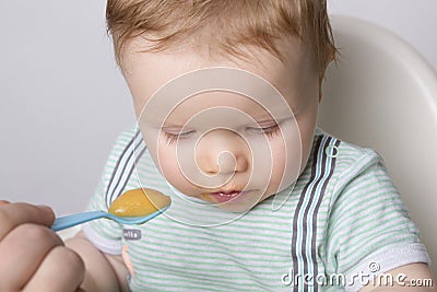 Feeding a small child Stock Photo