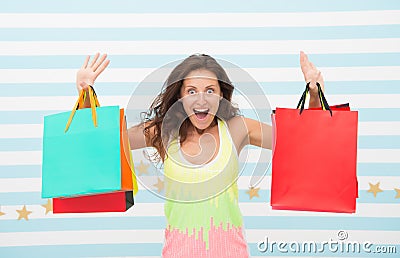 Feel free buy everything you want. Woman carries bunch shopping bags striped background. Finally bought favorite brand Stock Photo