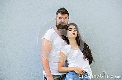 Feel their style. Couple friends hang out together grey wall background. Youth stylish outfit. Couple white shirts Stock Photo