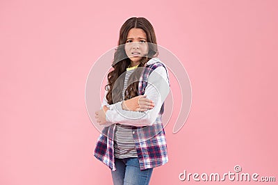 Feeling cold. Unhappy child tremble with cold. Autumn fashion. Casual style. Trendy streetwear. Low ambient temperature Stock Photo