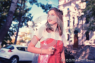 Beautiful dark-haired woman feeling free and relieved on her weekend Stock Photo