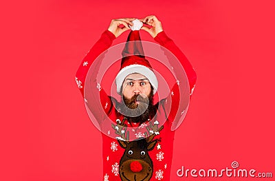feeling funny. man in santa hat await christmas present. hipster enjoy the holiday. ready for party celebration. new Stock Photo