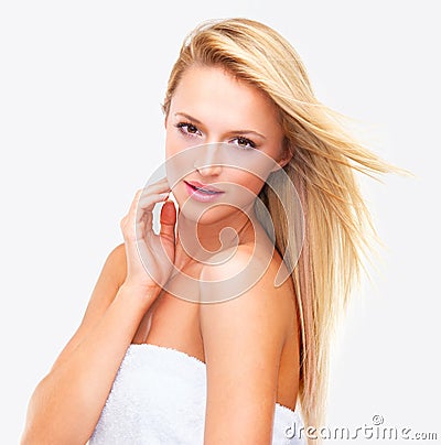 Feeling refreshed and invigorated. Portrait of a beautiful blonde woman with flawless skin looking shower-fresh - Stock Photo