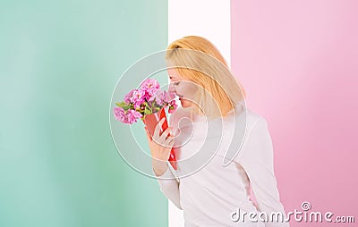 Feeling so special. Girl holding bouquet flowers enjoy favorite fragrance. Woman smiling likes to feel special attend to Stock Photo