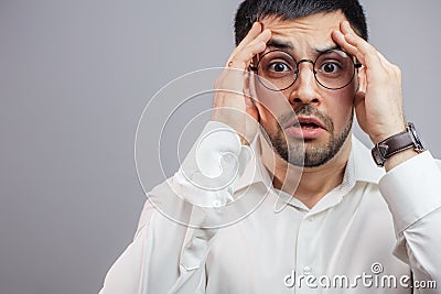 A young man is upset as he has been retired from employment Stock Photo