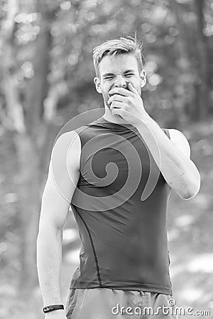 Feeling tired. Daily walk for healthy life. Muscular strong fit guy sport coach. Handsome sportsman in sportswear Stock Photo