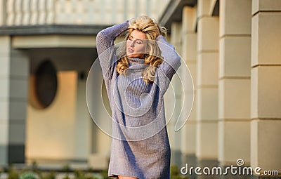 Feeling totally free. girl soft knitwear dress. cashmere woolen sweater. warm oversized clothes. sexy woman weather Stock Photo