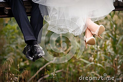 Feet of bride and groom, wedding shoes Stock Photo