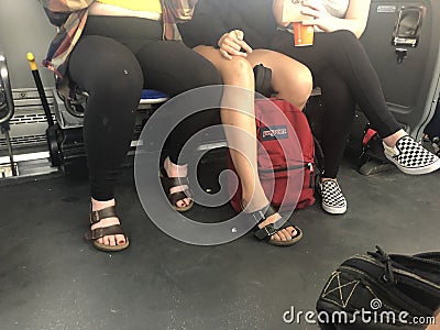 Feet on the bus Editorial Stock Photo