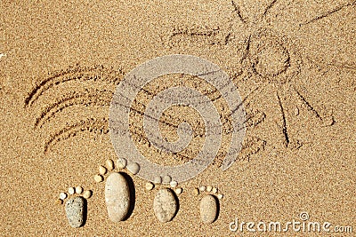 Feet of a family of stones on the sea Stock Photo