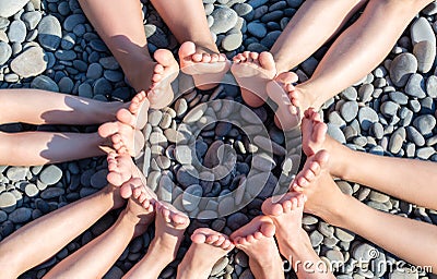 Feet figure a circle on the beach. Stock Photo