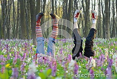 Feet in flowers Stock Photo