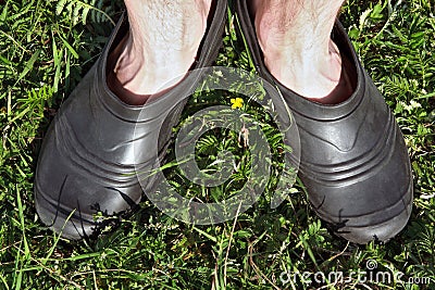 Feet in galoshes Stock Photo