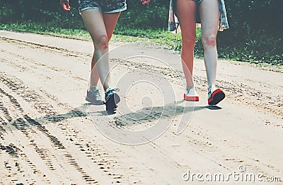 Feet girls walking on the road Lifestyle Travel Stock Photo