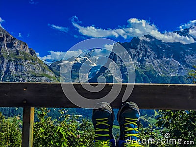 Feet looking at the views of the landscape Stock Photo