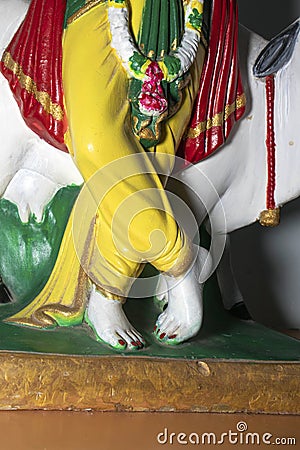 feet of Lord Krishna in Shri Krishan Janmashtami religious festival background of India with text in Hindi meaning Hare Rama Hare Stock Photo