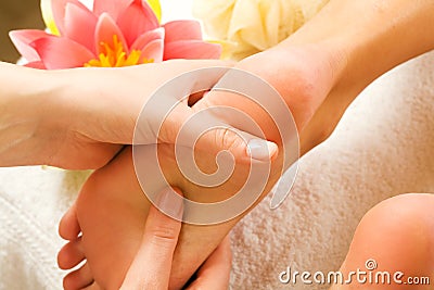 Feet massage Stock Photo