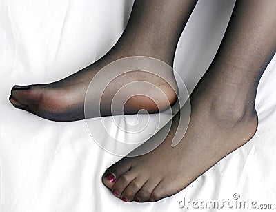 Feet and nylon Stock Photo