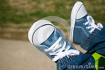 Feet with sneakers Stock Photo