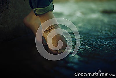 Feet in Water Stock Photo